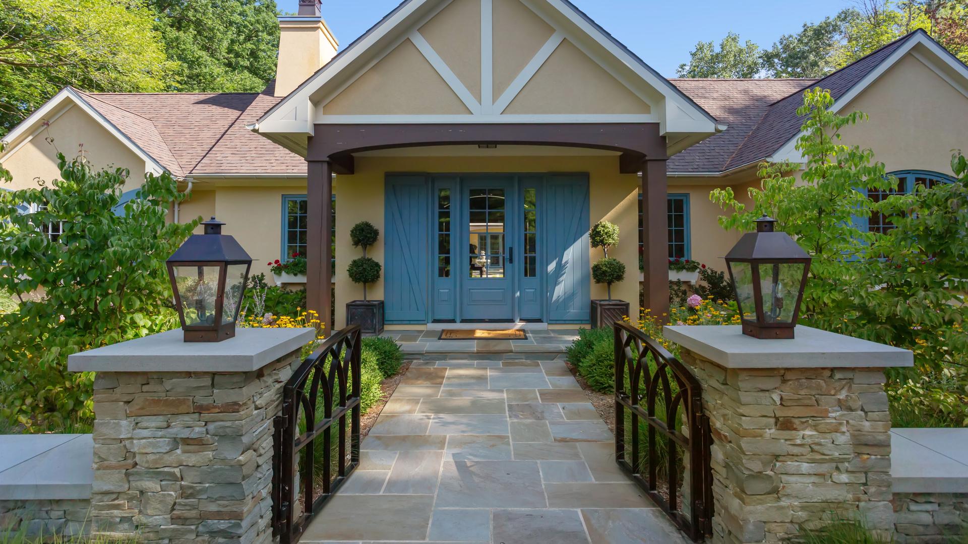 Detail of front door and plantings at Michigan residence