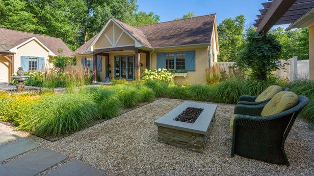 Michigan Residence landscape detail with fire pit and chairs