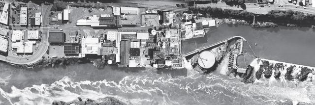 Aerial view of industrial site along the Willamette River at Willamette Falls.